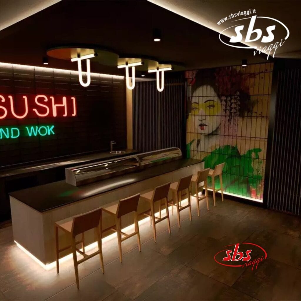 Un moderno ristorante di sushi con un lungo bancone, sgabelli da bar e un'insegna al neon 