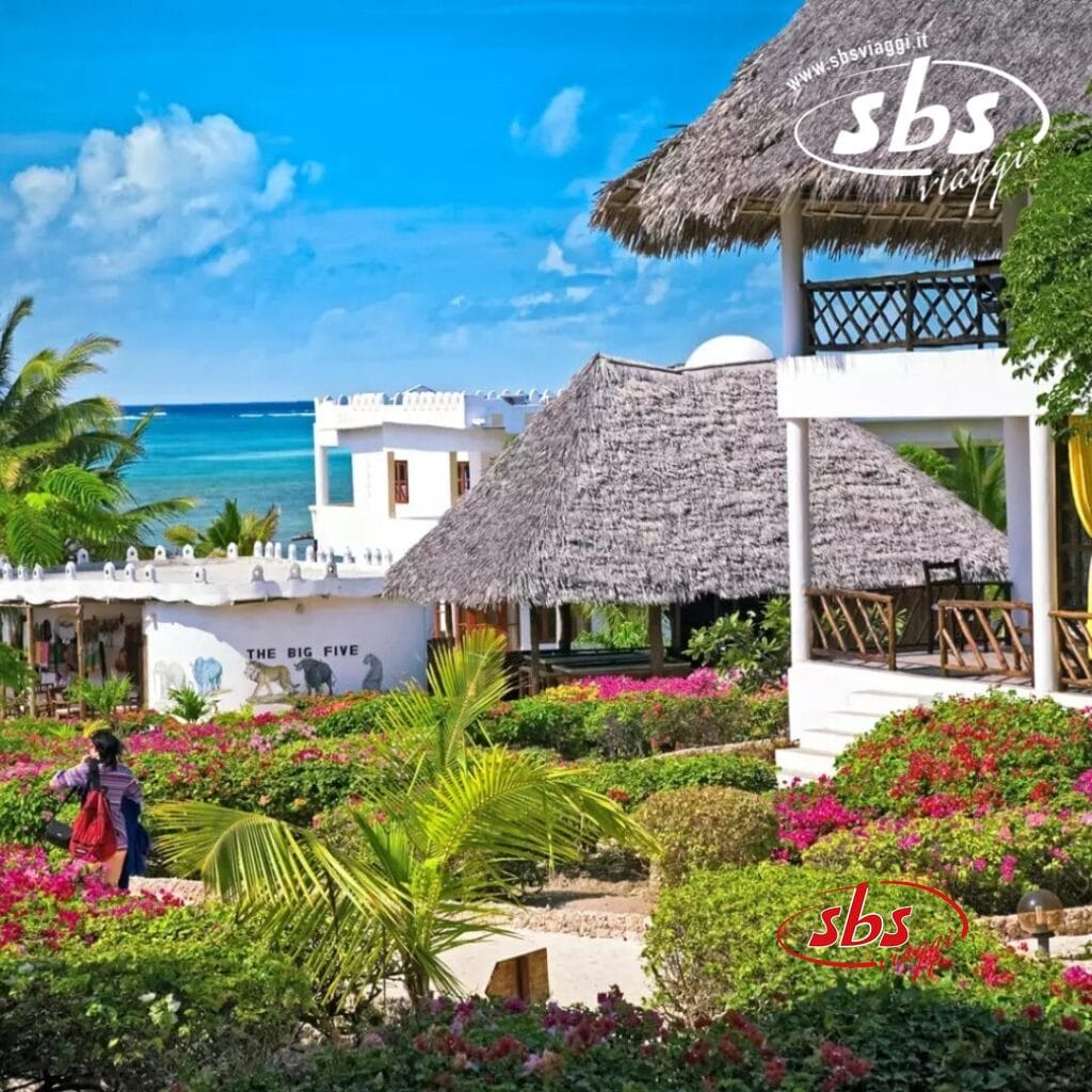 Un resort tropicale con tetti di paglia, fiori dai colori vivaci e vista sull'oceano sotto un cielo azzurro e limpido offre un'atmosfera simile a quella di una bozza automatica, un perfetto assaggio di paradiso.